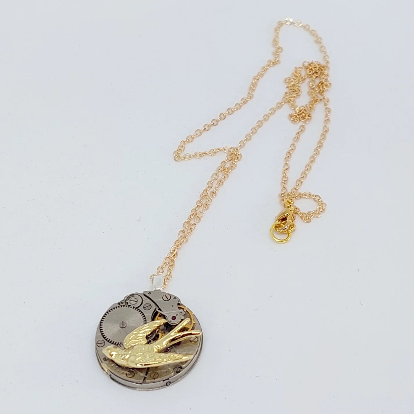 Timepiece Pendant - Golden Swallow